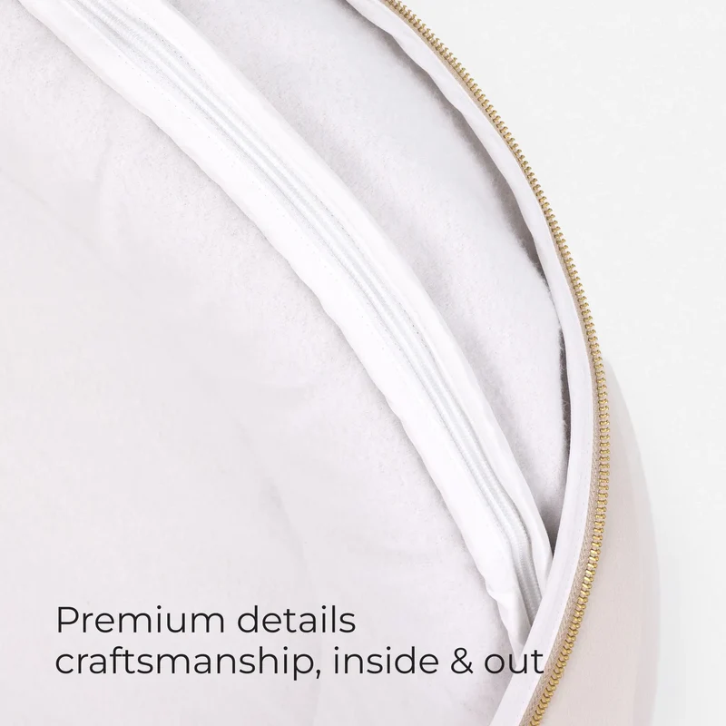 BarneyCurl Bed cover unzipped to show the white inner liner, with the words Premium details craftsmanship, inside & out