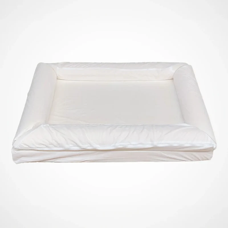 Waterproof Lining Kit: white liners fitted over a Barney Bed's foam base and bolsters, with a zip along the side.