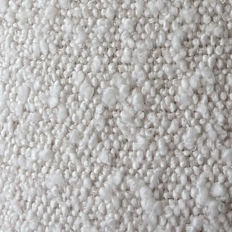 Close-up of the white looped fabric of the Bouclé Cover