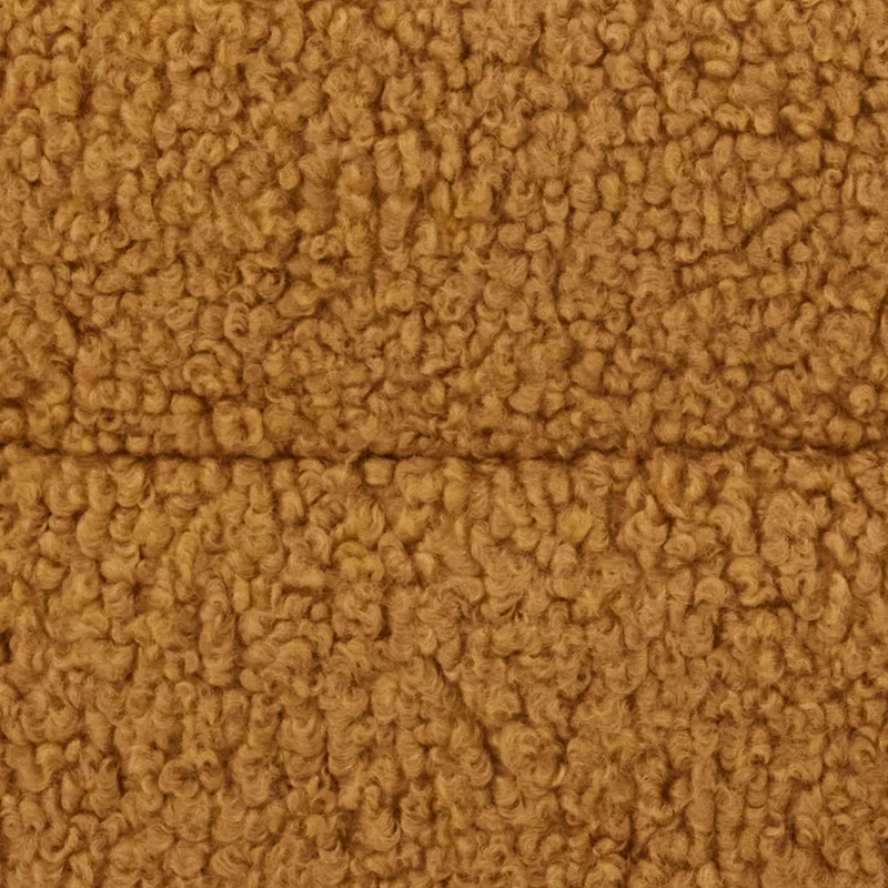 Close-up of a textured golden dog bed fabric from Barney Bed Australia