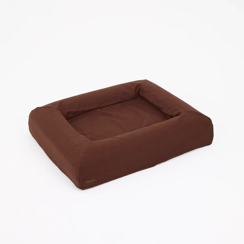 Linen Cover in Moose on a Barney Bed: the bed on its own from above at an angle, chocolate brown linen, bolsters all around.