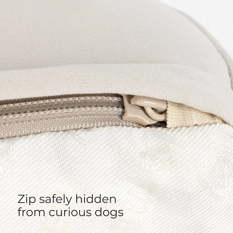 Hidden zipper tucked under the cover flap of a Barney Bed, with the words Zip safely hidden from curious dogs