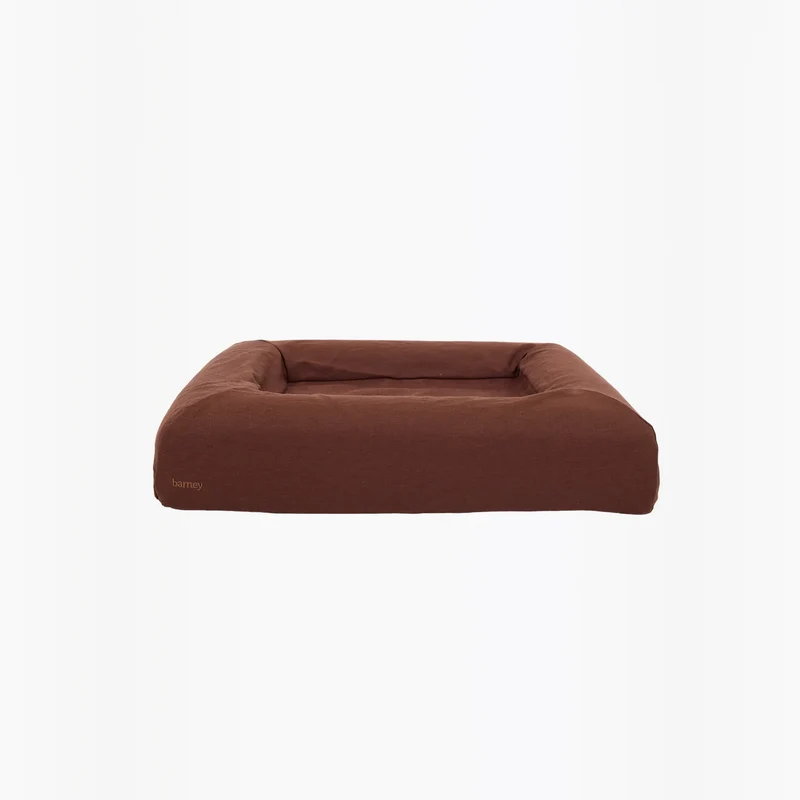 Linen Cover in Moose on a Barney Bed: the bed on its own from the front, chocolate brown linen with a small "barney".