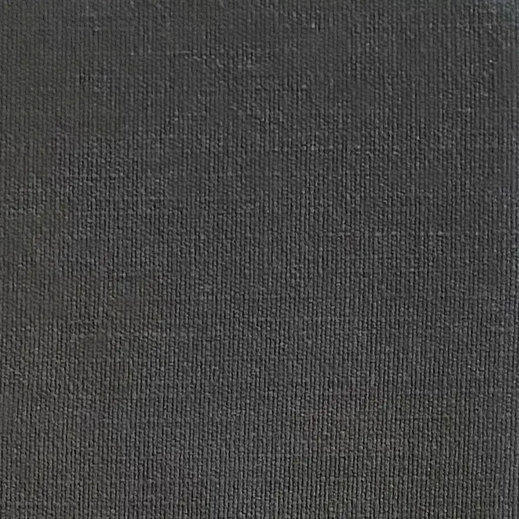 Basics Cover in Charcoal: close-up of the dark grey woven fabric.