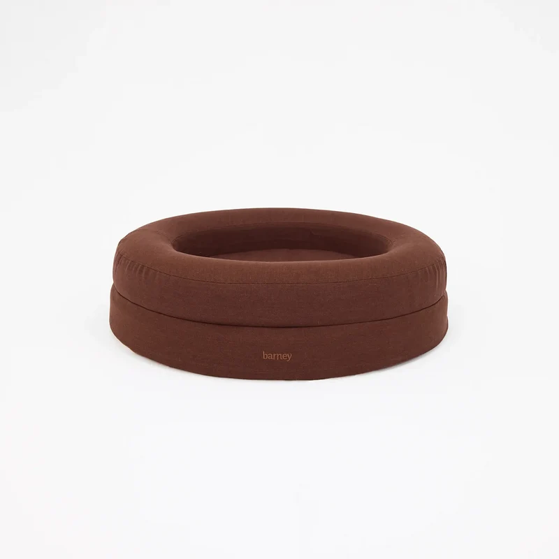 Linen Cover Curl in Moose: the round bed on its own, chocolate brown linen with a small "barney" on the side.