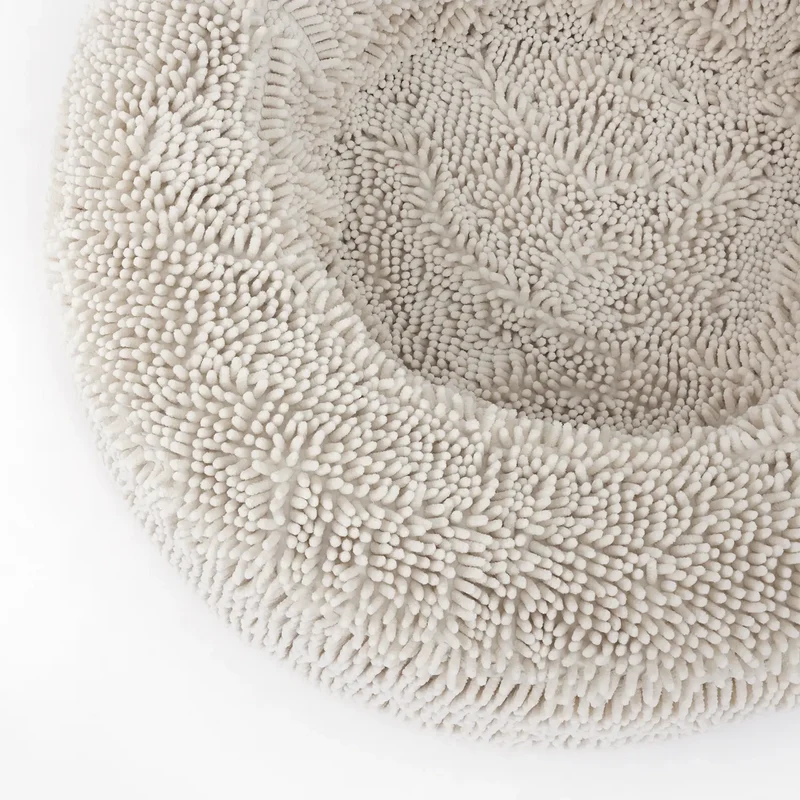 Sugarloaf dog bed with a textured, soft surface designed for comfort and style